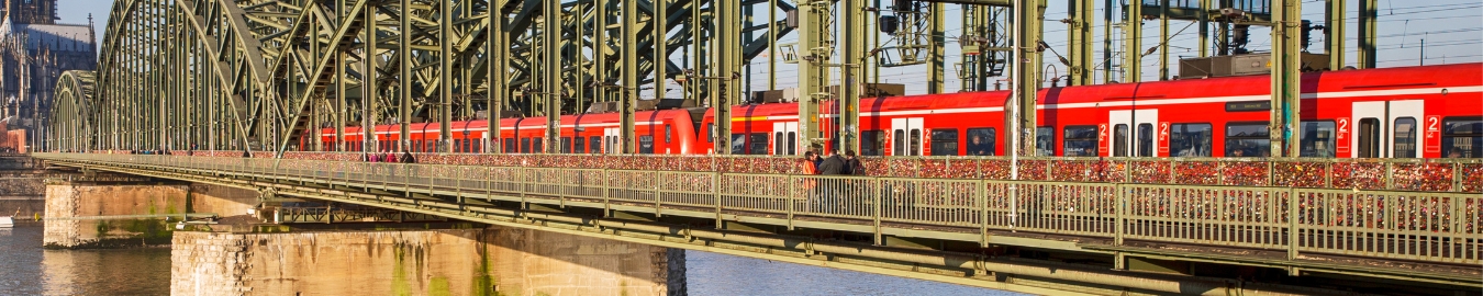 Train on Hohenzollern Bridge Train on the Hohenzollern Bridge in Cologne crosses the Rhine.